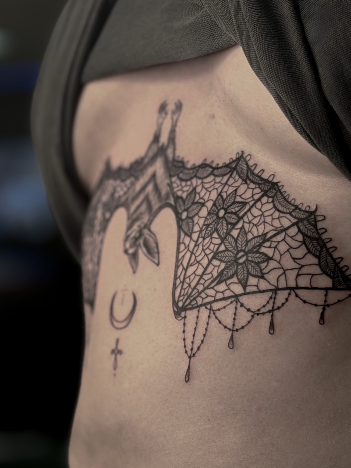 Detailed lace-wing bat tattoo